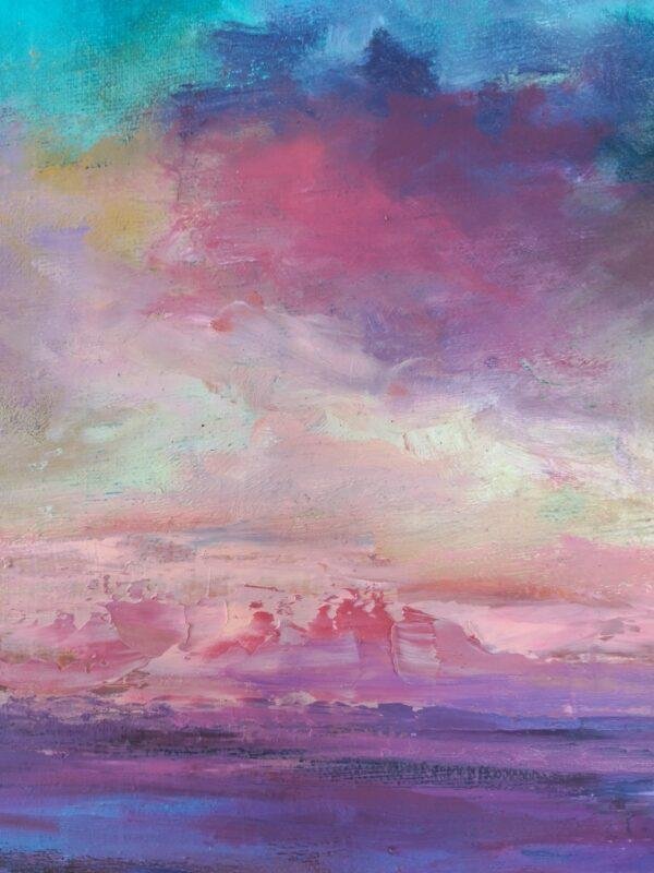 magie et la tranquillité d'un crépuscule céleste, où le ciel se transforme en un kaléidoscope de couleurs se reflétant sur une étendue d'eau calme