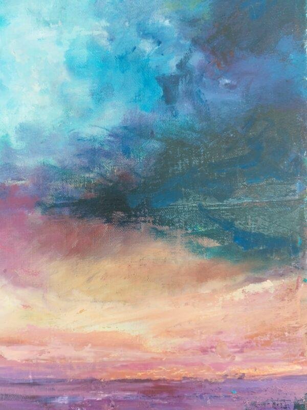 magie et la tranquillité d'un crépuscule céleste, où le ciel se transforme en un kaléidoscope de couleurs se reflétant sur une étendue d'eau calme